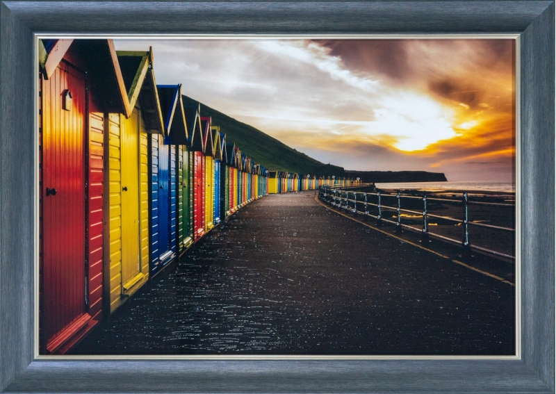 captured beach huts framed wall art