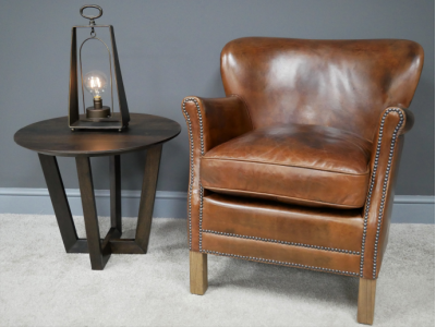 cosy brown leather occasional chair  £699